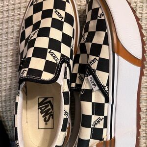Vans Black and White Checkered Slip-On Sneakers